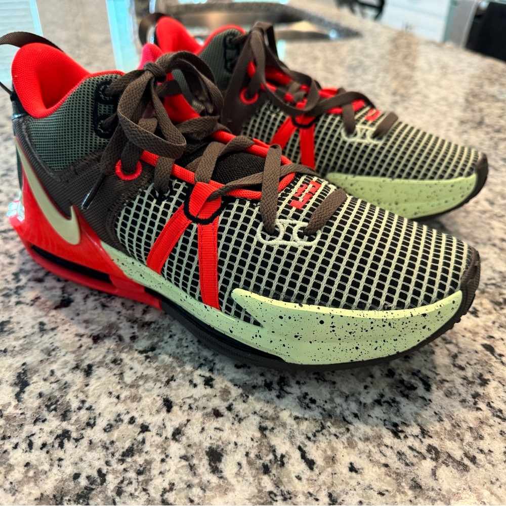 Up for sale are my BRAND NEW Lebron Witness XII Shoes. Size 9.5.